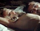 Ursula Andress shows boobs and butt in bed nude clips