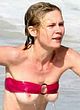 Kirsten Dunst paparazzi topless beach photos pics