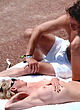 Sharon Stone topless on a beach with huney pics