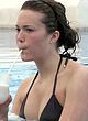 Mandy Moore sunbathes in bikini at a pool pics