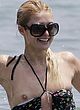 Paris Hilton naked pics - exposes breasts on a beach