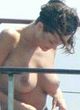 Manuela Arcuri caught topless on a yacht pics