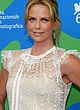 Charlize Theron showing long legs in venice pics