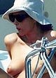 Monica Bellucci naked pics - sunbathes topless on a yacht