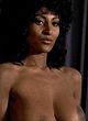 Pam Grier exposing tits & pussy in movie pics