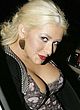 Christina Aguilera showing cleavage in the car pics