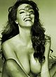 Emanuela Folliero tanning topless & posing nude pics