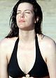 Liv Tyler naked pics - tanning in bikini on a beach
