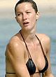 Gisele Bundchen caught in bikini on a beach pics
