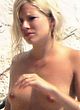 Sienna Miller caught topless on a beach pics