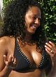 Melanie Brown deep cleavage in black bikini pics