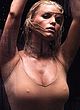 Jessica Simpson exposes tits in wet lingerie pics