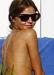 Miranda Kerr caught by paparazzi topless pics