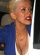 Christina Aguilera shwoing cleavage in a car pics