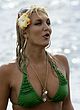 Brooke Hogan deep cleavage in green bikini pics