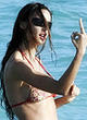 Nina Moric bikini and topless on beach pics