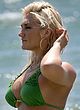 Brooke Hogan sunbathes in bikini on a beach pics