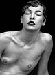 Milla Jovovich exposes tits and hairy bush pics