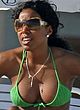 Kelly Rowland sunbathing in bikini on beach pics