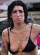 Amy Winehouse naked pics - exposes tits on a beach