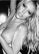 Aubrey O'Day squeezes her big bare tits pics