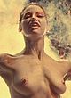 Gina Gershon dances topless in thong pics