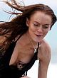 Lindsay Lohan naked pics - flashes side boob in bikini
