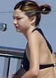 Miranda Kerr sunbathes in bikini on a yacht pics
