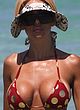Shauna Sand naked pics - sunbathes topless on a beach