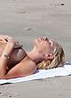 Sophie Monk sunbathes topless & bikini pics