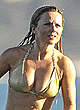 Geri Halliwell caught in bikini on a beach pics