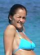 Minka Kelly sunbathes in blue bikini pics