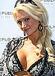 Holly Madison shows legs and cleavage pics