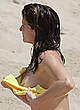 Stephanie Seymour titslip in yellow bikini shots pics