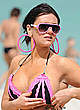Jenni Farley shows cleavage in bikini pics