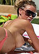 Lauren Pope caught topless on the beach pics