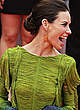 Evangeline Lilly in short dress shows her legs pics