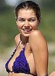 Jessica Hart sunbathes in bikini on a beach pics