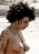 Amy Winehouse caught topless on a beach pics