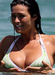 Manuela Arcuri grabbed her tits in a bikini pics