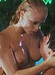 Elizabeth Berkley makes love in a pool pics