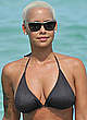 Amber Rose deep cleavage in black bikini pics