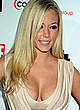 Kendra Wilkinson shows legs and cleavage pics