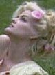Anna Nicole Smith naked pics - posing outdoors in the sun
