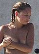 Nicole Richie caught holds her nude boobs pics