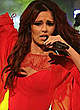 Cheryl Tweedy pefroms in red on the stage pics