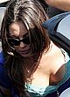 Mila Kunis shows off deep cleavage pics