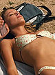 Odette Yustman showering and in bikini pics