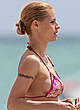 Michelle Hunziker caught in bikini on the beach pics