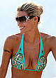 Michelle Hunziker caught in bikini on the beach pics